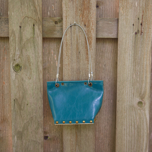 Sm Gloss Teal Runway Handbag by Renee Sonnichsen - © Blue Pomegranate Gallery