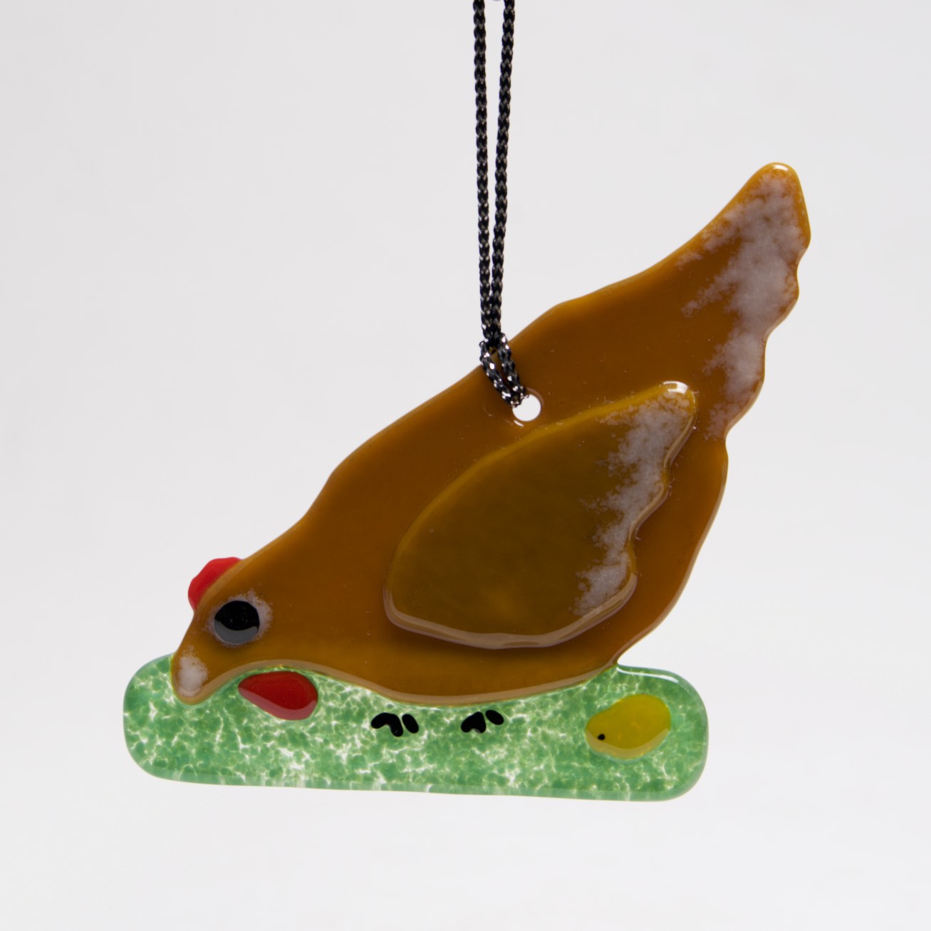 Chicken feeding Ornament, Sun Catcher by Charlotte Behrens - © Blue Pomegranate Gallery