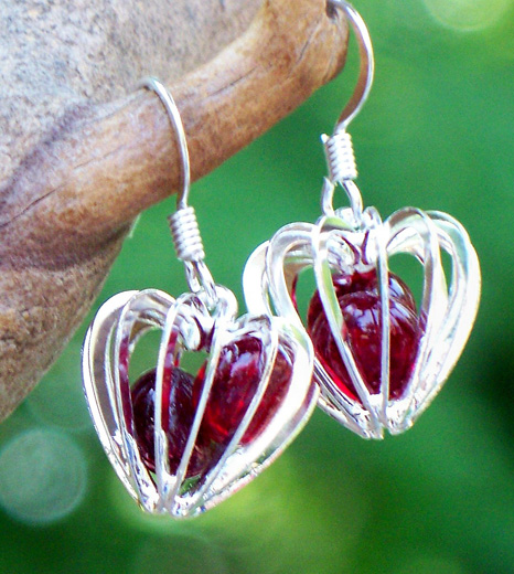 Ruby Heart Cage Earrings by Laura Bergman - © Blue Pomegranate Gallery