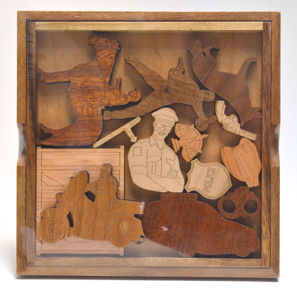 Police Wood Puzzle by David Janelle - © Blue Pomegranate Gallery