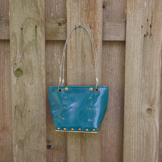 Sm Gloss Teal Runway Handbag by Renee Sonnichsen - © Blue Pomegranate Gallery