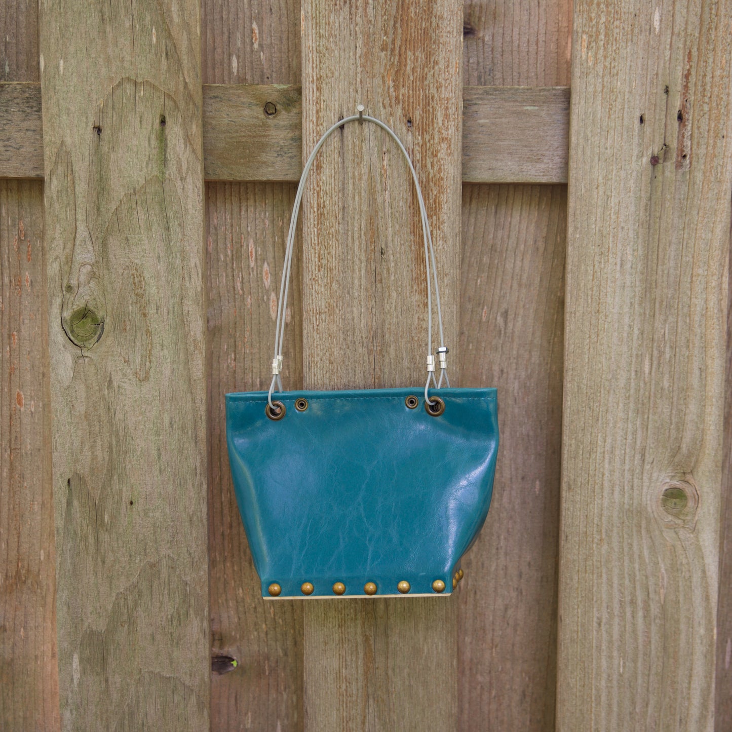 Sm Gloss Teal Runway Handbag by Renee Sonnichsen - © Blue Pomegranate Gallery