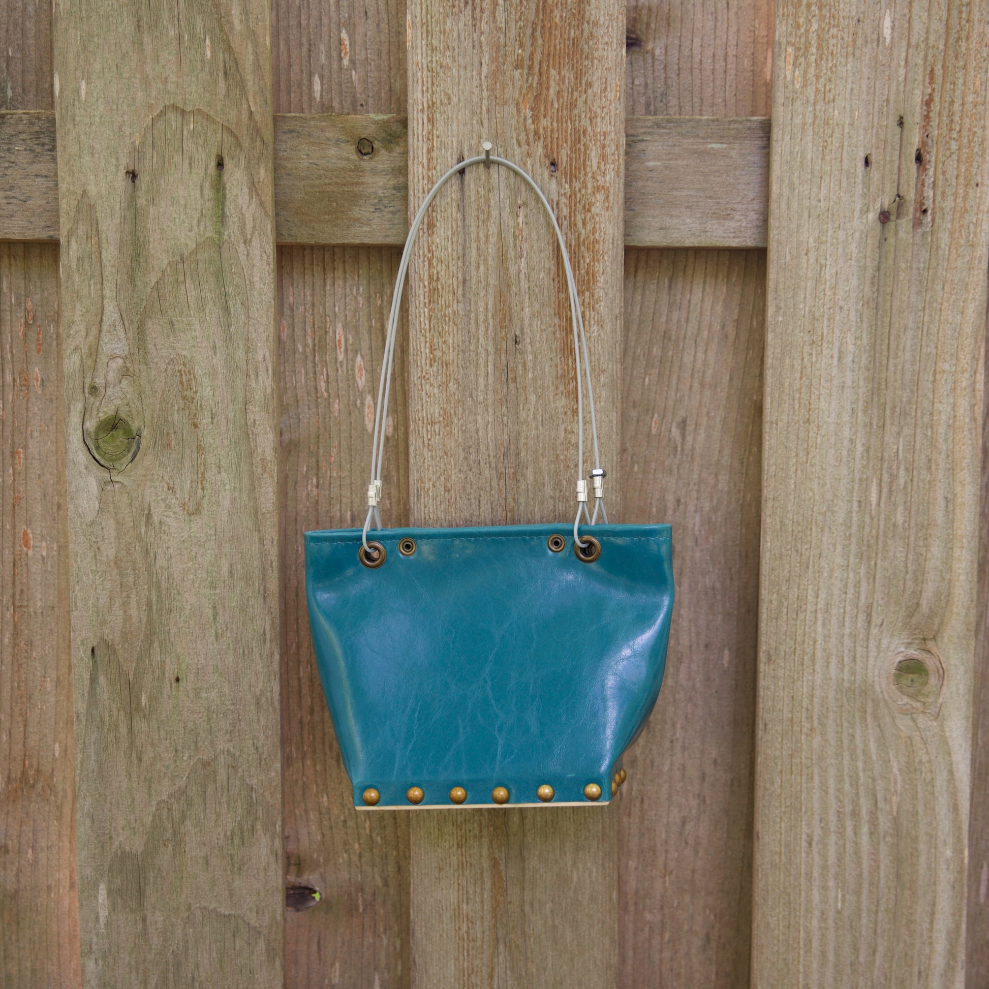 Sm Gloss Teal Runway Handbag by Renee Sonnichsen - © Blue Pomegranate Gallery