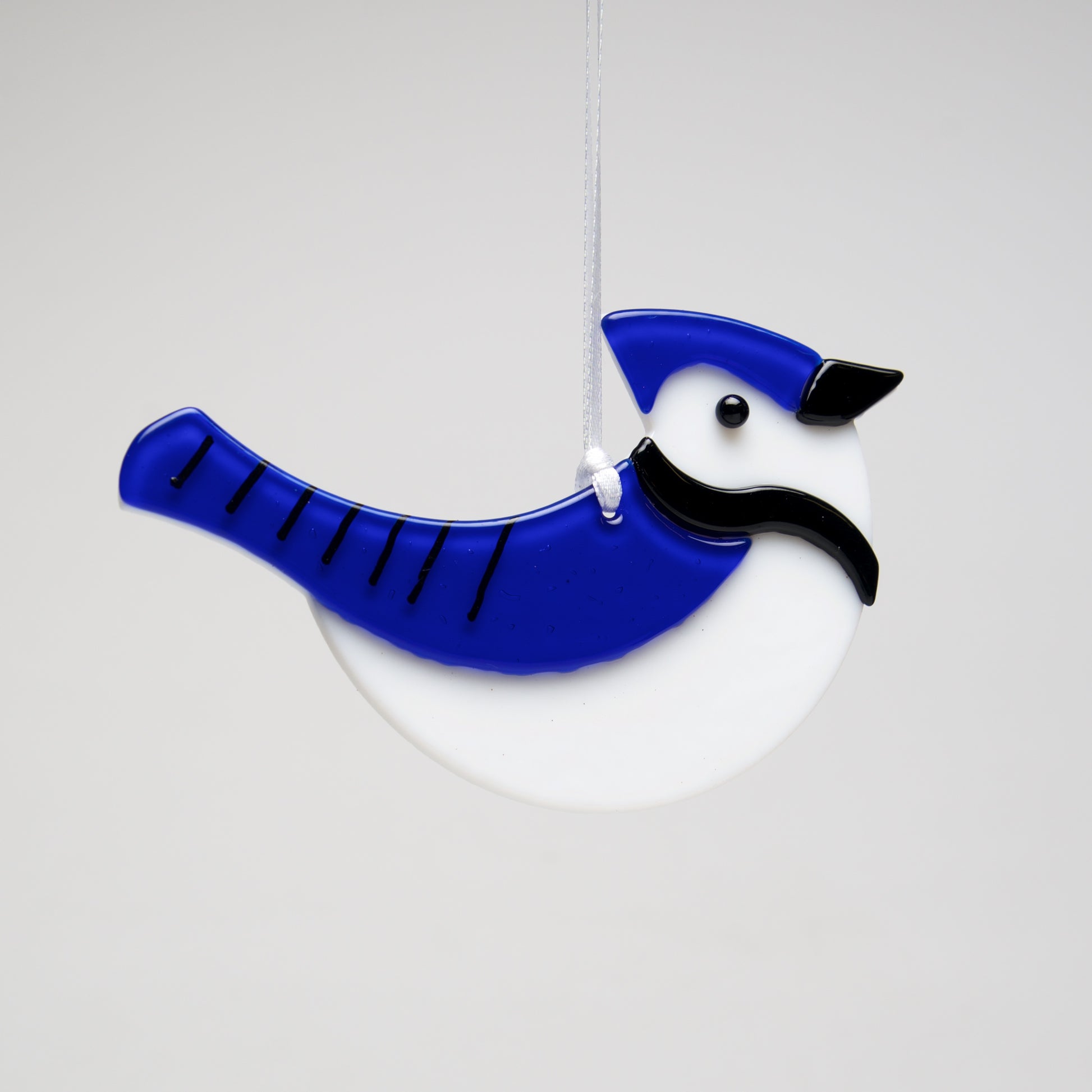 Glass Bluejay ornament by Sondra Gerber - © Blue Pomegranate Gallery